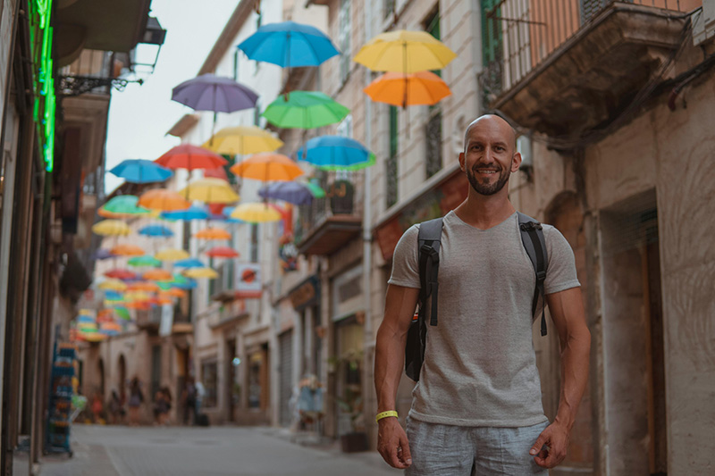 man traveling in foreign city