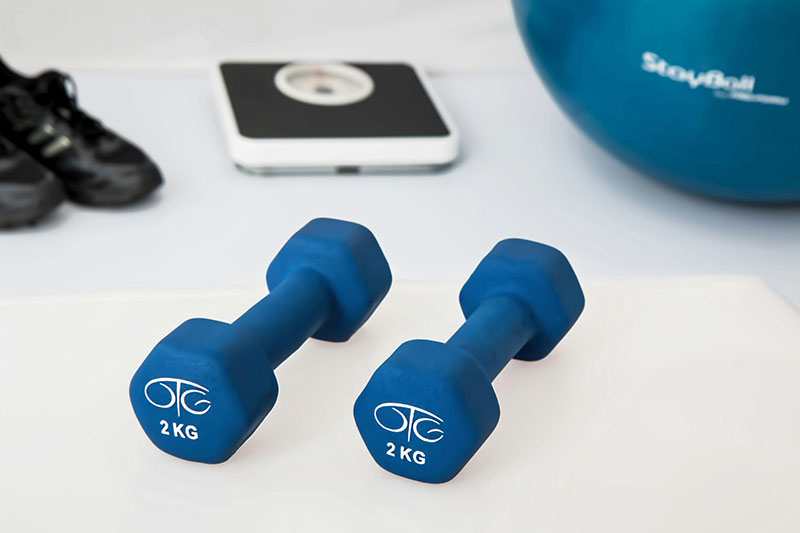 2 kg dumbells with a scale and fitness ball